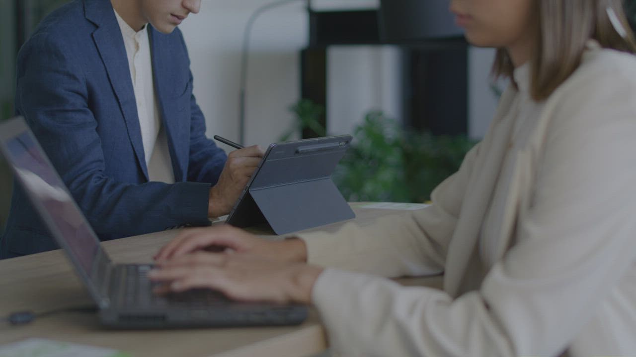 A client reviewing payment approval details for a software milestone